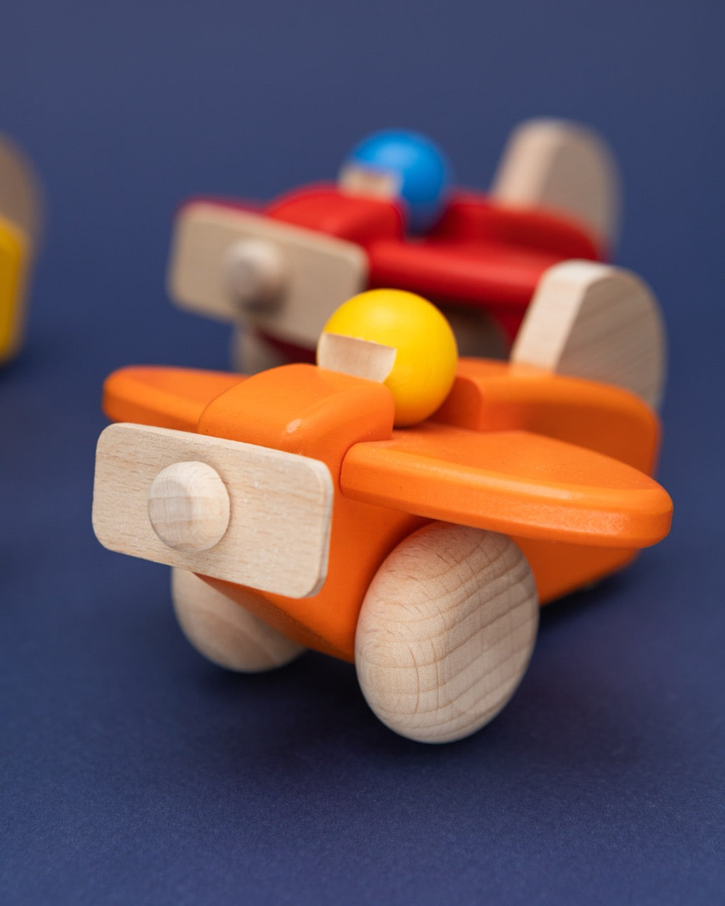 Wooden Orange Propeller Plane with Pilot