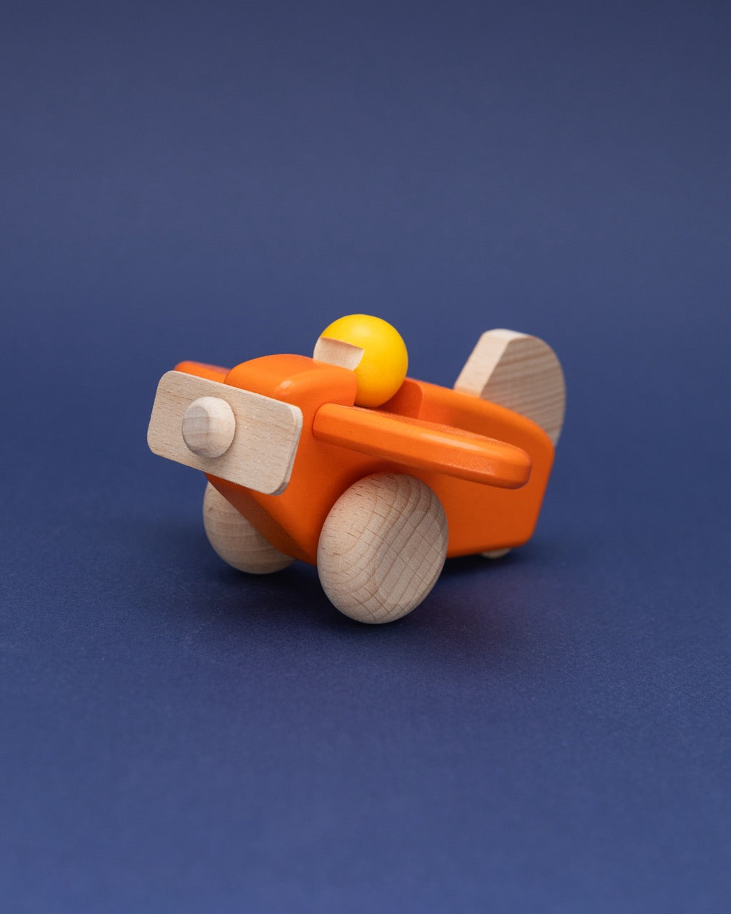 Wooden Orange Propeller Plane with Pilot